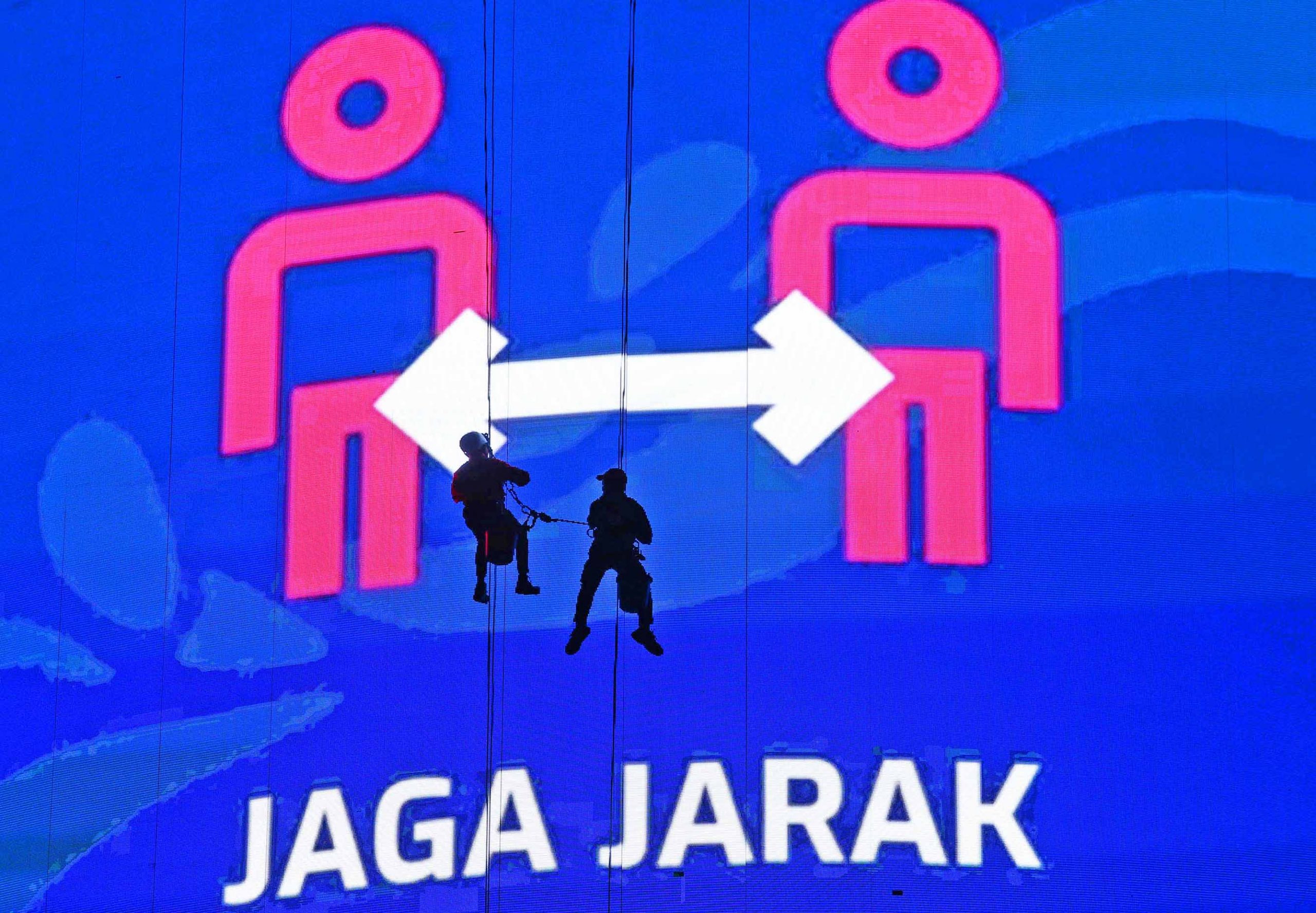 Papan reklame tersebut berisikan himbawan agar selalu Memakai Masker, Menjaga Jarak dan Mencuci Tangan agar terhindar dari Covid.foto:Netizenindonesia.id